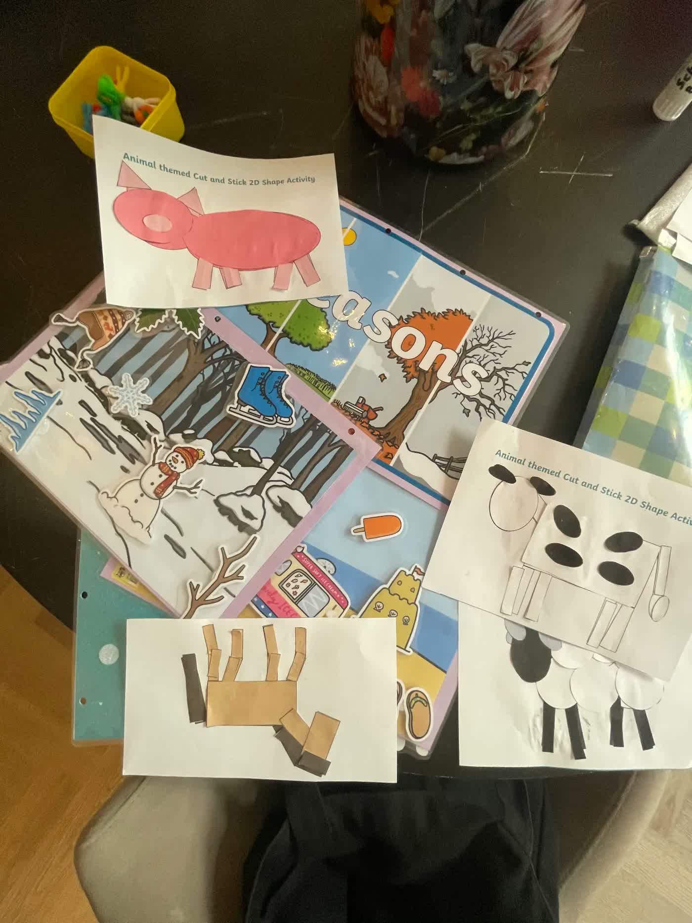 Cut-and-stick shape activities and a seasons board